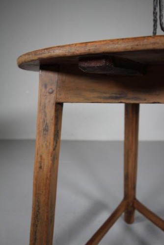 An 18th-century painted pine cricket table featuring a circular wooden top supported by three legs and triangular lower stretchers. View VII