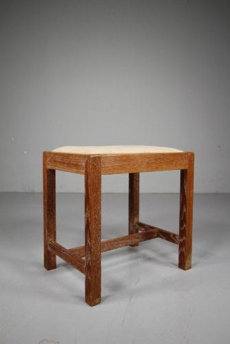 A 1920s oak stool featuring square straight legs connected by low stretchers and topped with a cushioned off-white seat. View IV