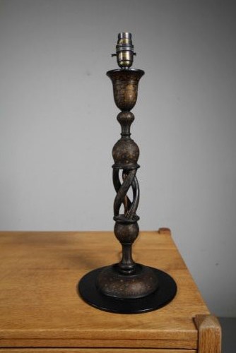 A 1920s Kashmiri carved wooden table lamp base featuring an open spiral twist column with gold foliate lacquered details on a dark circular plinth. View IV