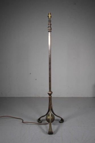 An antique Edwardian silver-plated standard lamp featuring an adjustable telescopic stem and a tripod base with a central spherical ornament. View VI