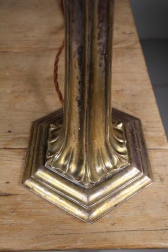 A tall antique silver-plated table lamp featuring a fluted column, classical foliate capital, and a stepped hexagonal base. View II