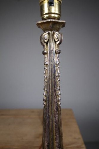 A tall antique silver-plated table lamp featuring a fluted column, classical foliate capital, and a stepped hexagonal base. View III
