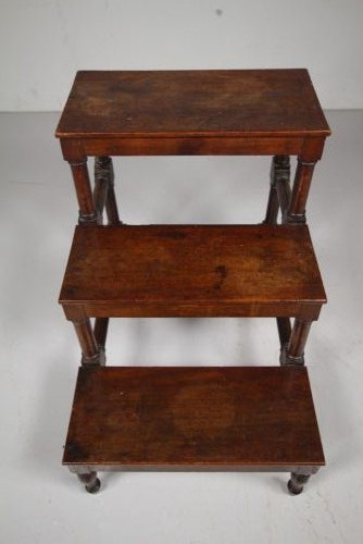 A three-tiered set of 19th-century dark mahogany library steps featuring turned legs and supporting stretchers. View VIII