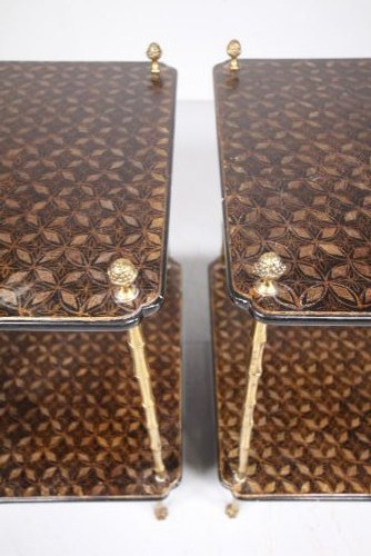 A pair of mid-century two-tier side tables with brass simulated bamboo legs and brown patterned lacquered surfaces topped with pinecone finials. View V