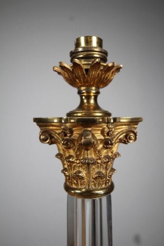 A tall 19th-century clear cut-glass table lamp featuring a fluted column, stepped square base, and an ornate gilt brass Corinthian capital. View III