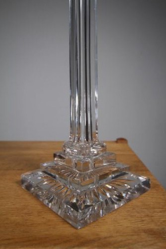 A tall 19th-century clear cut-glass table lamp featuring a fluted column, stepped square base, and an ornate gilt brass Corinthian capital. View IV