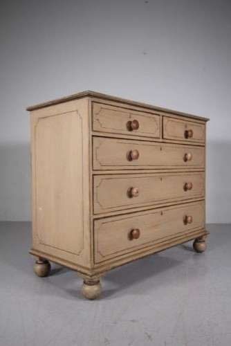 A Georgian painted pine chest of drawers featuring two short over three long drawers with turned knobs and hand-painted line borders. View II