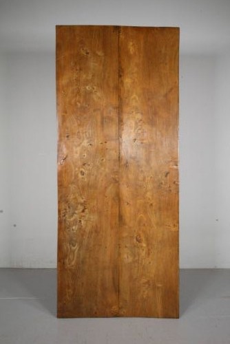 An early 19th century primitive dining table crafted from timber featuring a thick slab top and splayed legs. View VIII