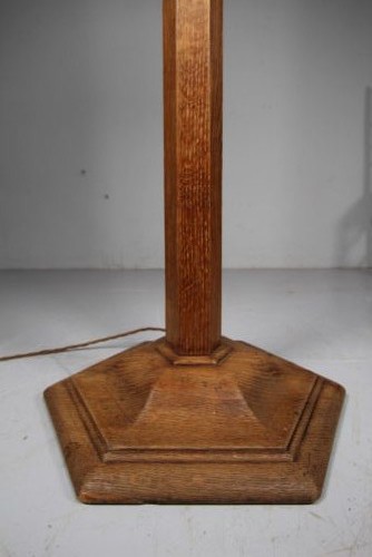 A 1930s Arts and Crafts solid oak standard floor lamp featuring a tapered octagonal column and a stepped octagonal base. View II