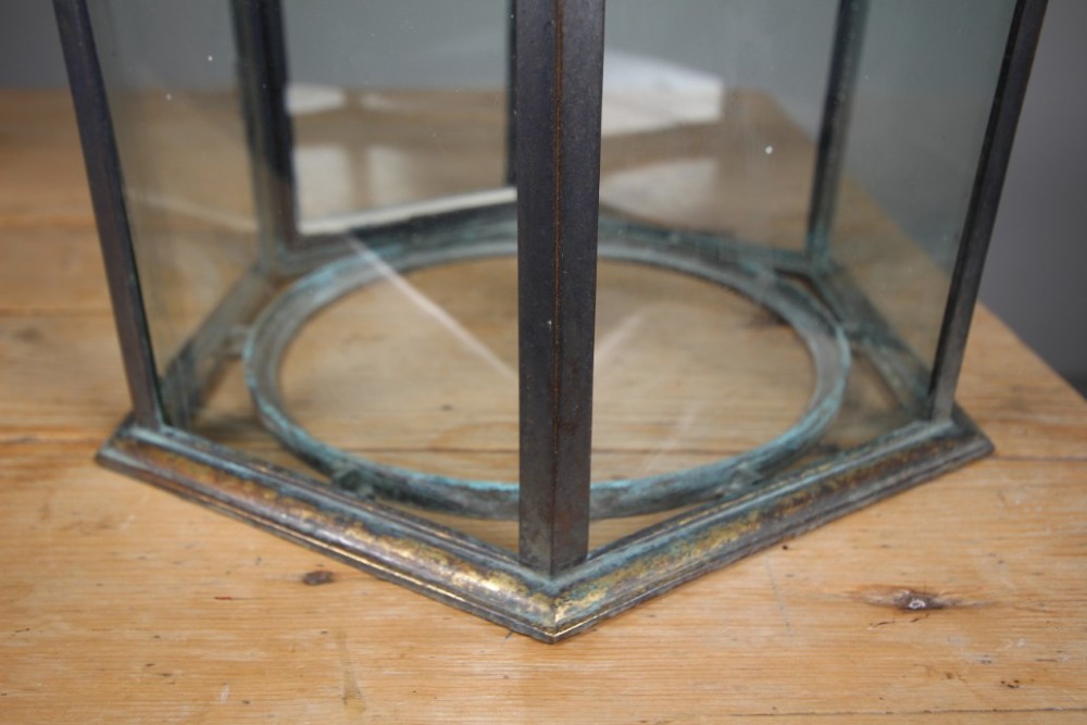 A 19th-century dark bronze hexagonal hallway lantern featuring glazed glass side panels, a domed cage top, and a central hanging stem. View III