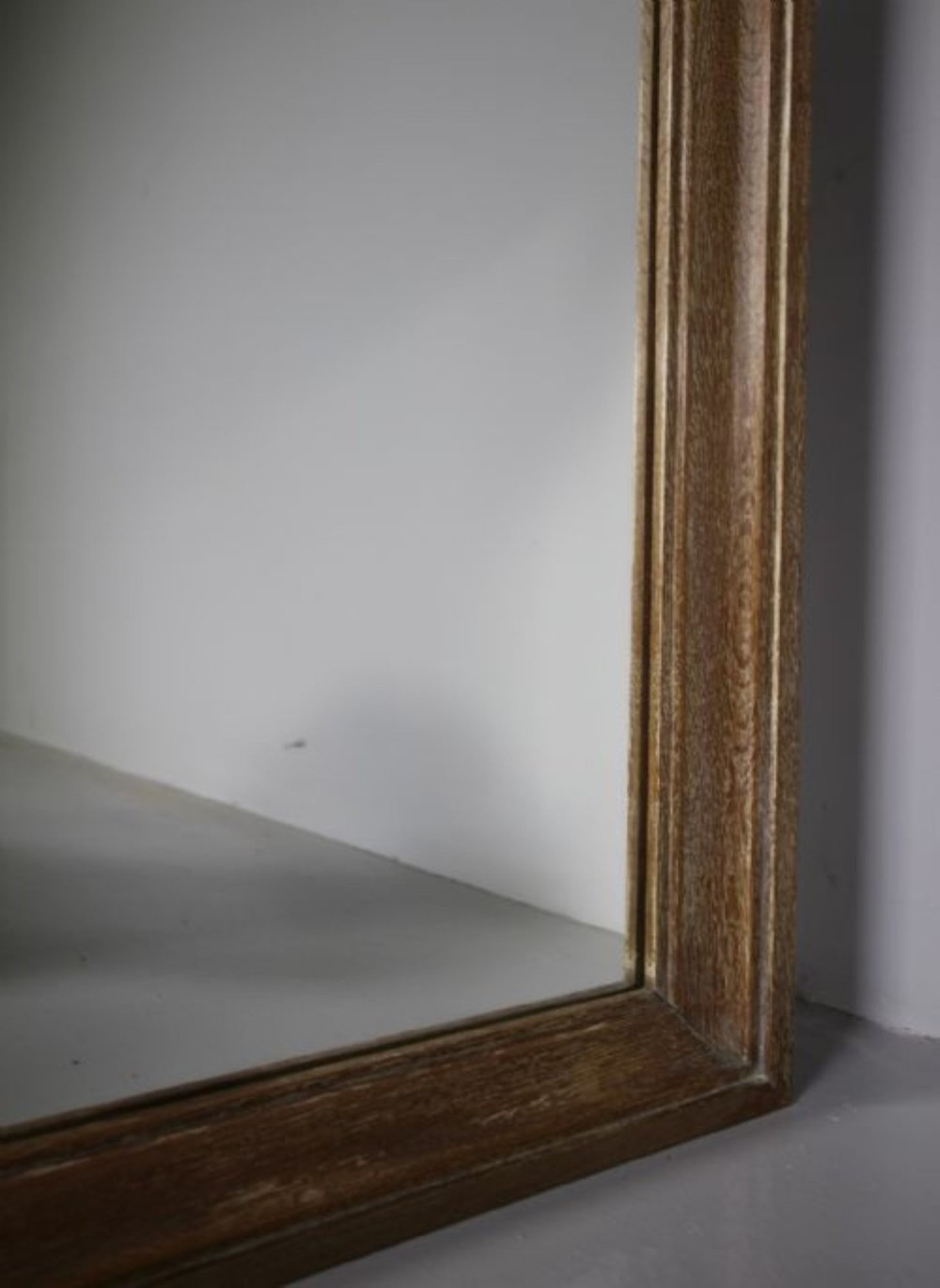 A large 1920s rectangular wall mirror featuring a wide moulded oak frame with natural wood grain. View II