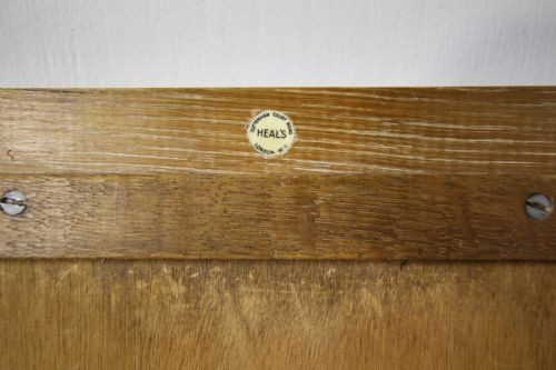 A large 1920s rectangular wall mirror featuring a wide moulded oak frame with natural wood grain. View IV