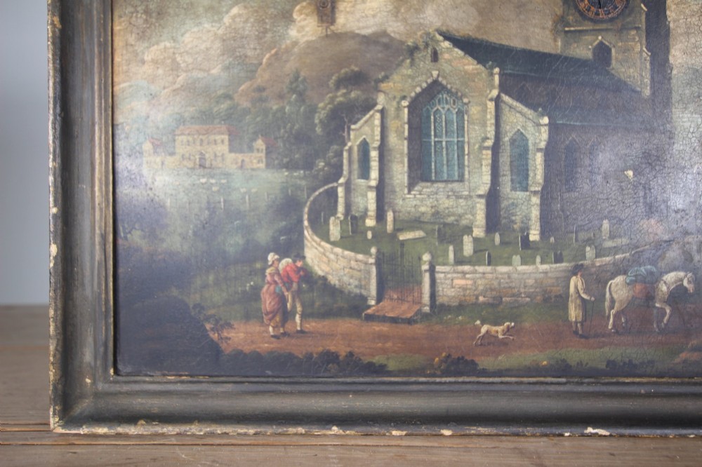 An 18th-century oil painting on tin depicting a church landscape with integrated mechanical clock hands and a visible waterwheel mechanism, enclosed in a dark wooden frame. View VI