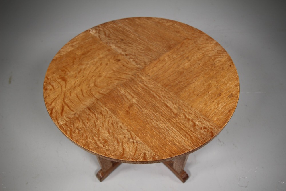 A circular oak two-tier side table featuring straight square legs and an X-frame base stretcher. View II