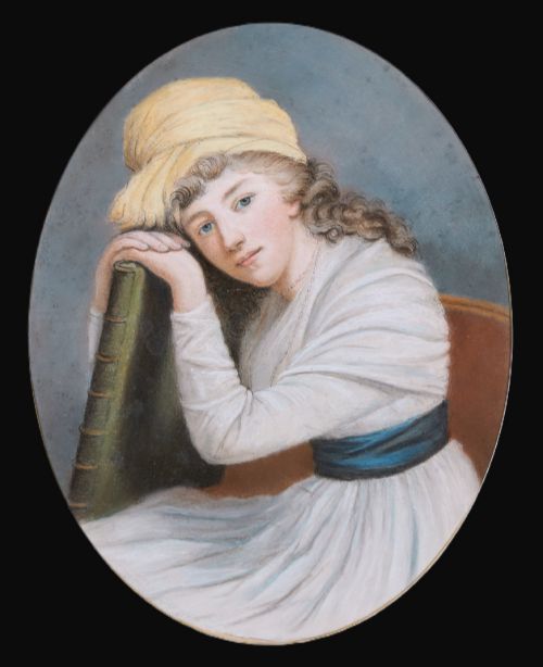 fig 1. An 18th-century oval portrait painting of a young woman wearing a white dress and yellow headpiece, housed within a rectangular gilded wooden frame with rosette corner details.
