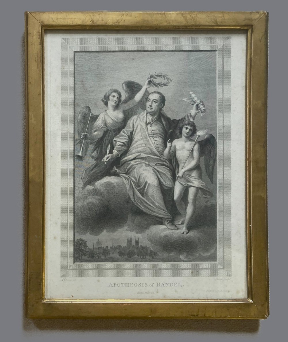 An 18th-century monochrome copperplate engraving depicting George Frideric Handel surrounded by allegorical figures, displayed within a moulded gilt wood frame.