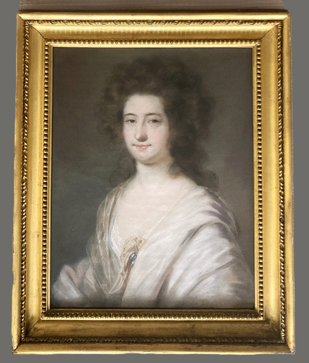 A late 18th-century pastel portrait depicting a woman with voluminous brown hair wearing a draped white shawl and lace detail. View II