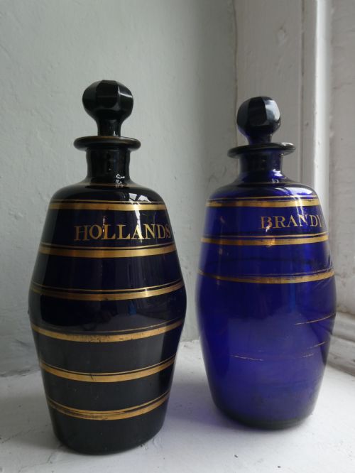Two Bristol Blue Gin & Brandy Bottles