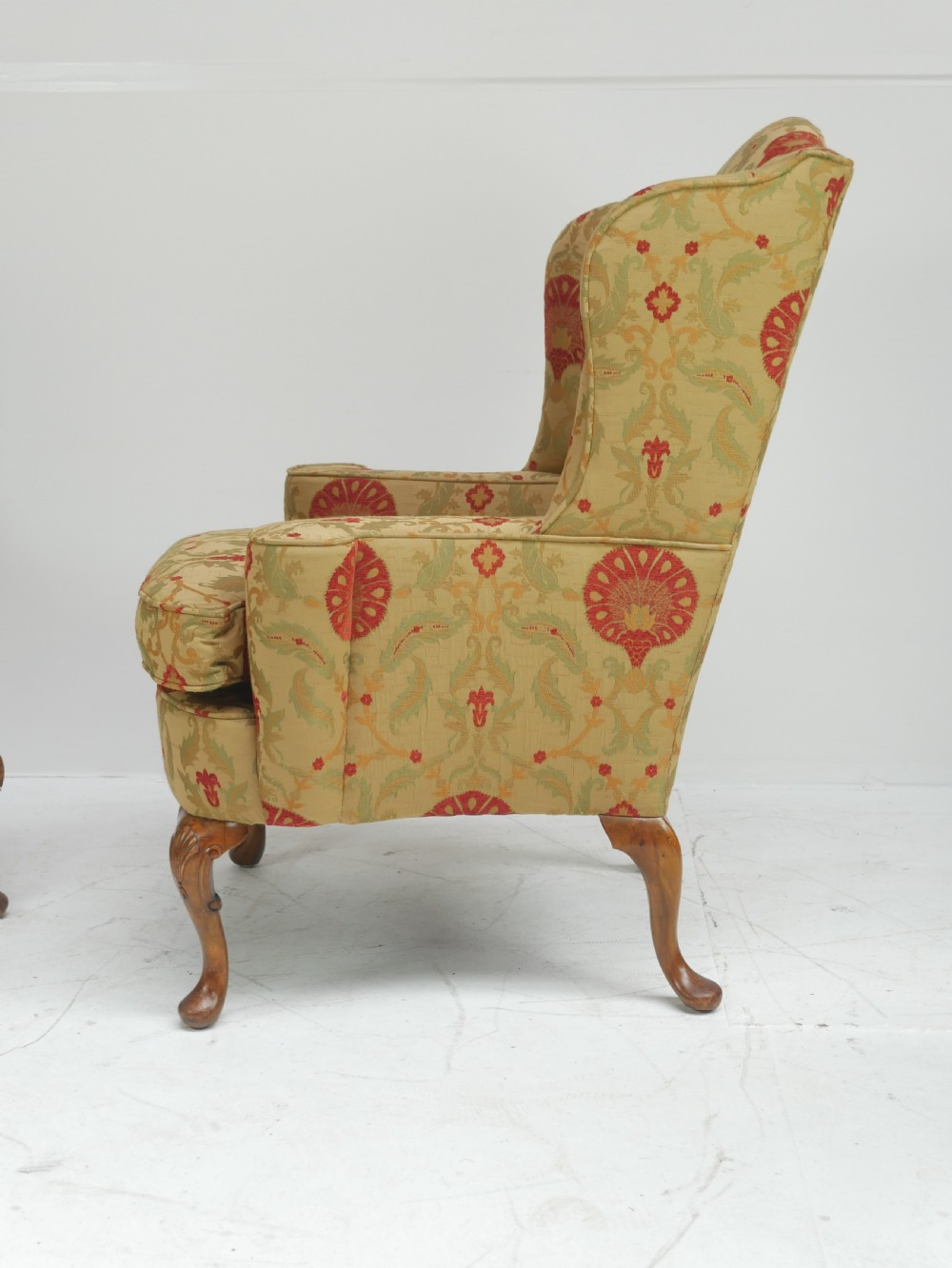 A Pair of 19th century walnut wing armchairs. View III