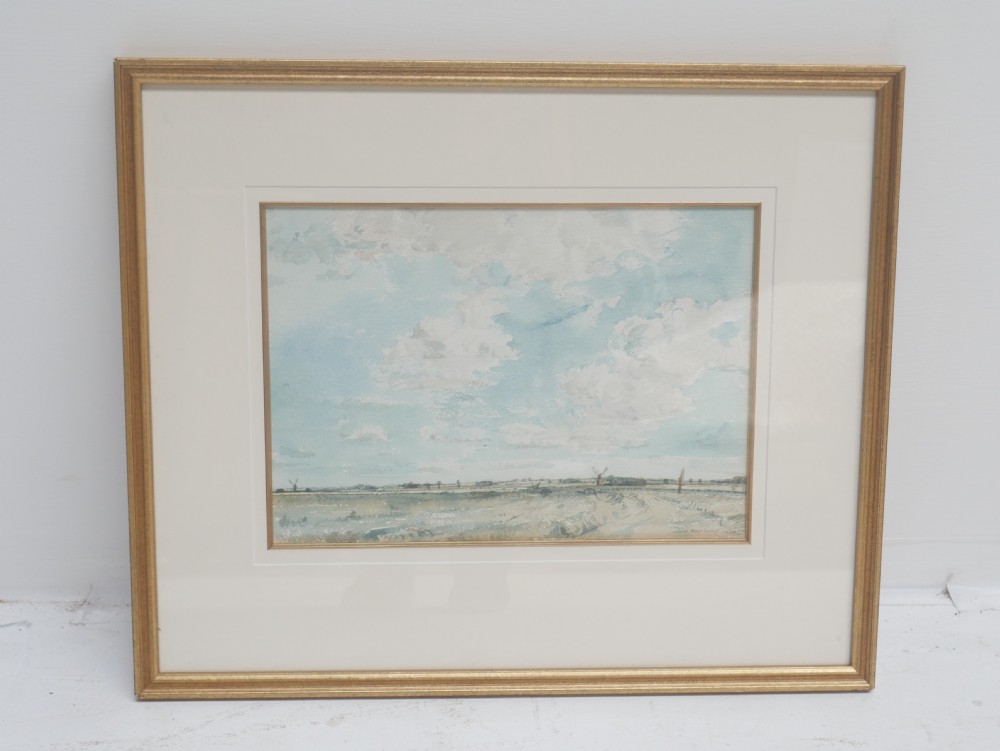 A framed watercolour painting by David Muirhead depicting an expansive sky above a low Cambridgeshire horizon within a slim gilt frame.