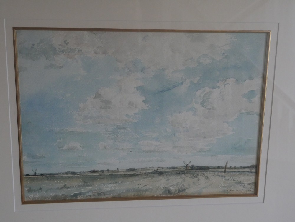 A framed watercolour painting by David Muirhead depicting an expansive sky above a low Cambridgeshire horizon within a slim gilt frame. View VI