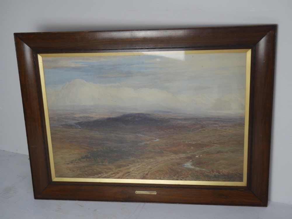 A framed Victorian watercolour landscape painting by Arthur H. Enock showing the Isle of Man moorland under a cloudy sky. View V