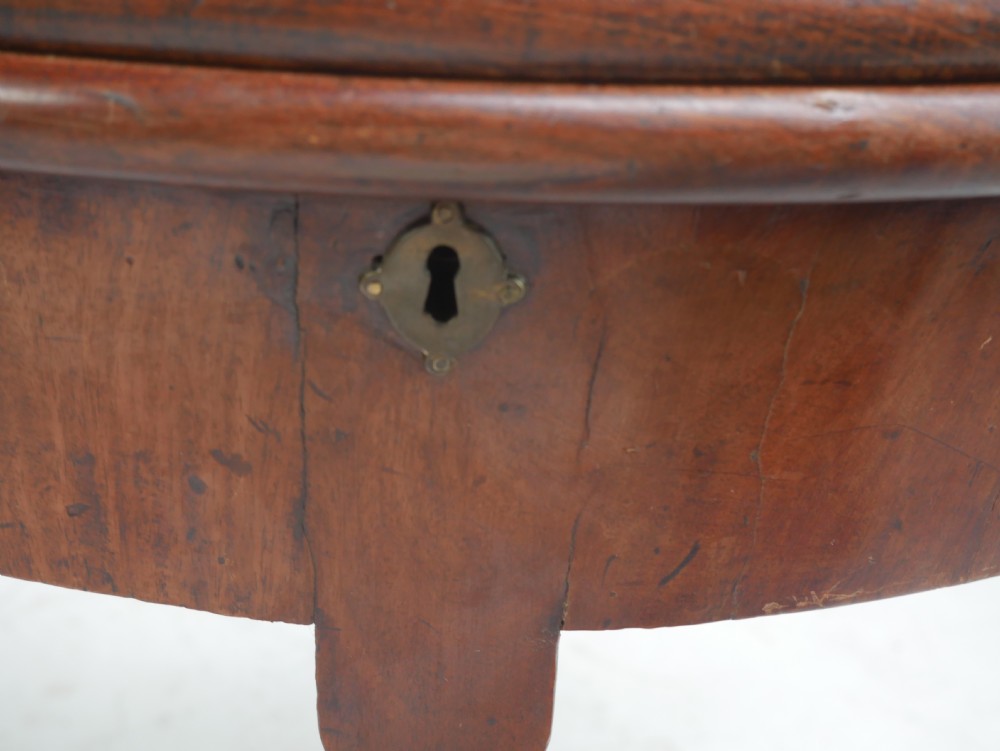 An 18th-century mahogany demi-lune games table featuring a folding semi-circular top supported by slender legs with pad feet. View XIV