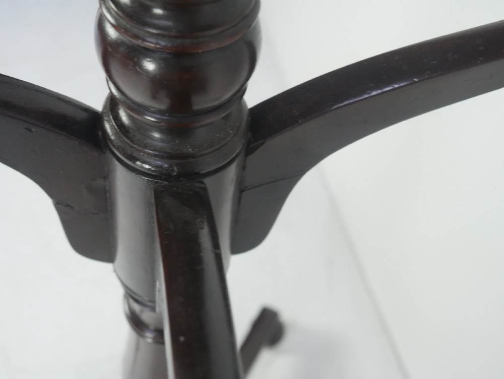 A tall 19th-century turned dark mahogany hat and coat stand with tiered curved branches and a tripod base. View VI
