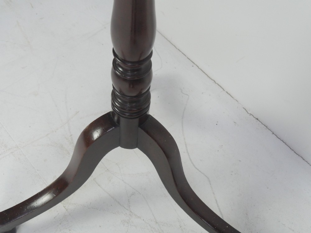 A tall 19th-century turned dark mahogany hat and coat stand with tiered curved branches and a tripod base. View VII