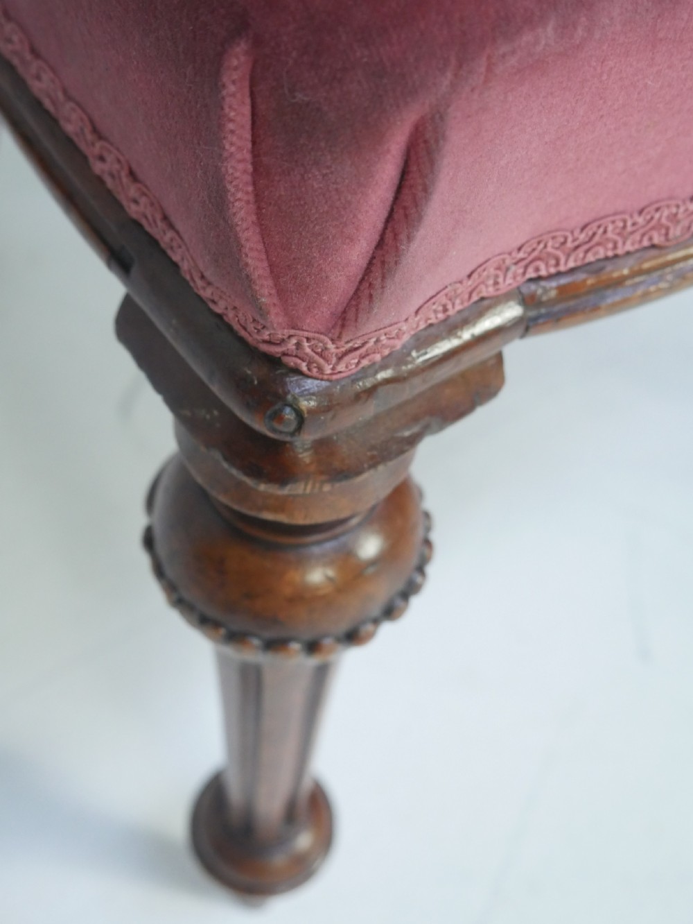 A set of four 19th-century Victorian walnut balloon-back chairs upholstered in rose pink velvet with carved back rails and turned front legs. View XII
