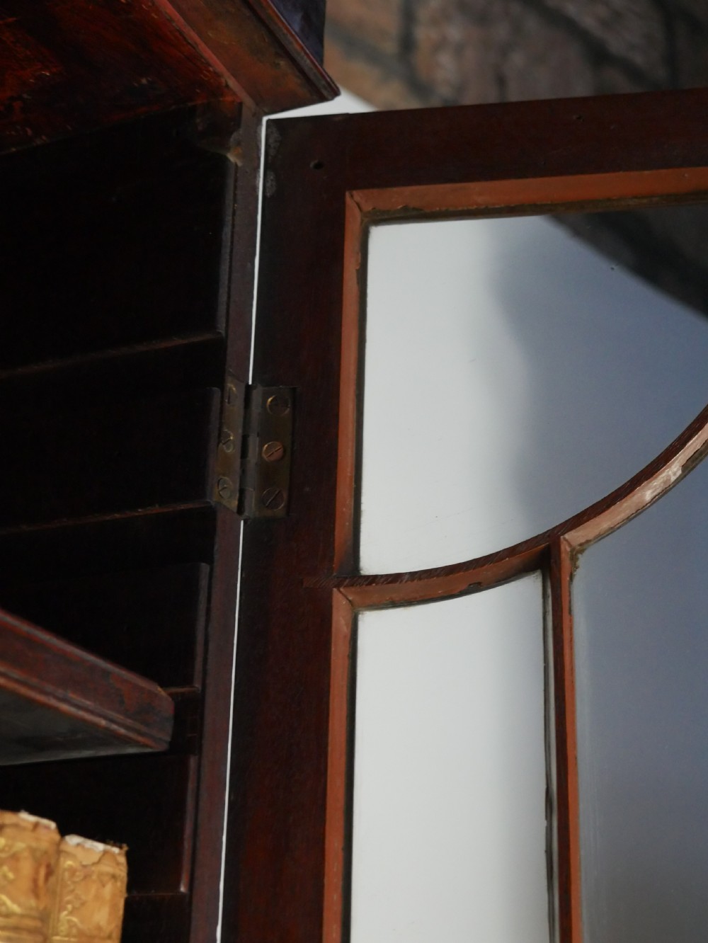 A 19th-century dark mahogany secretaire bookcase featuring an upper glazed two-door cabinet over a drop-front fitted writing desk and three lower drawers. View VIII