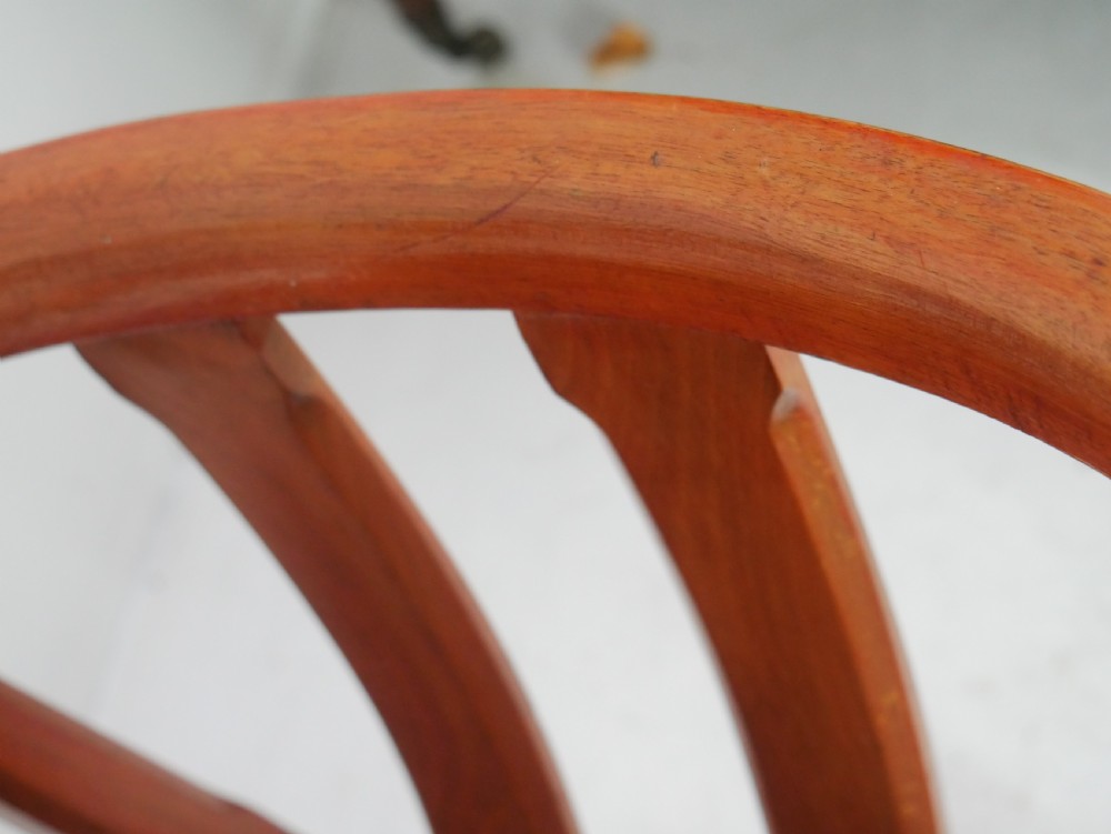 A pair of warm wood Arts and Crafts tub chairs with curved slat backs and blue upholstered seats. View IX
