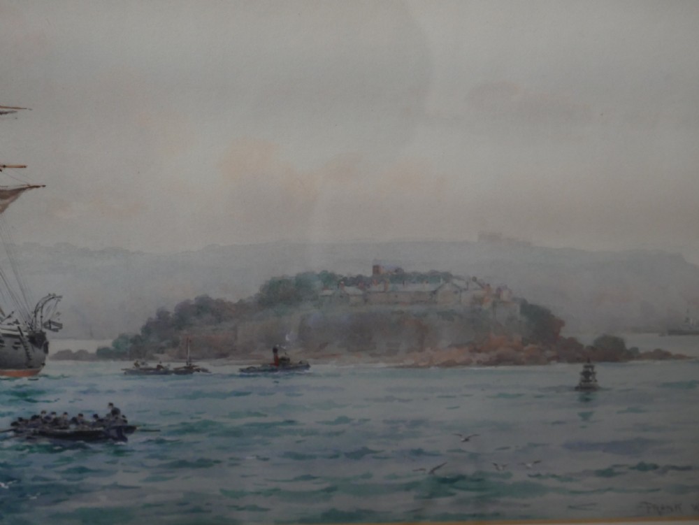 A framed Edwardian marine watercolour painting depicting a multi-masted sailing vessel at anchor near a hilly coastline in a slender gilt frame with a double mount. View IV