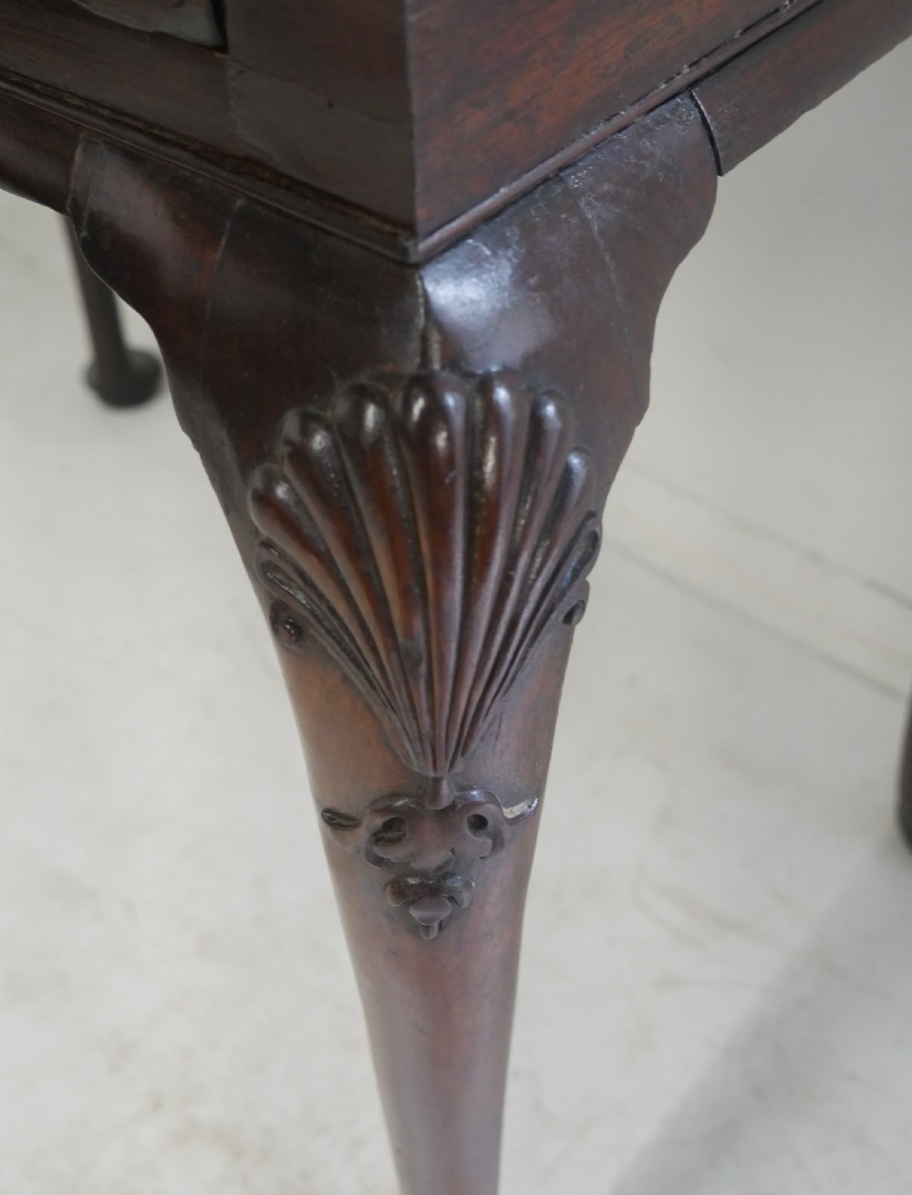 A 19th-century dark mahogany side table featuring a single frieze drawer, carved shell motifs on cabriole legs, and pad feet. View III