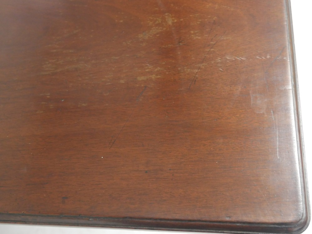 A 19th-century dark mahogany side table featuring a single frieze drawer, carved shell motifs on cabriole legs, and pad feet. View VI