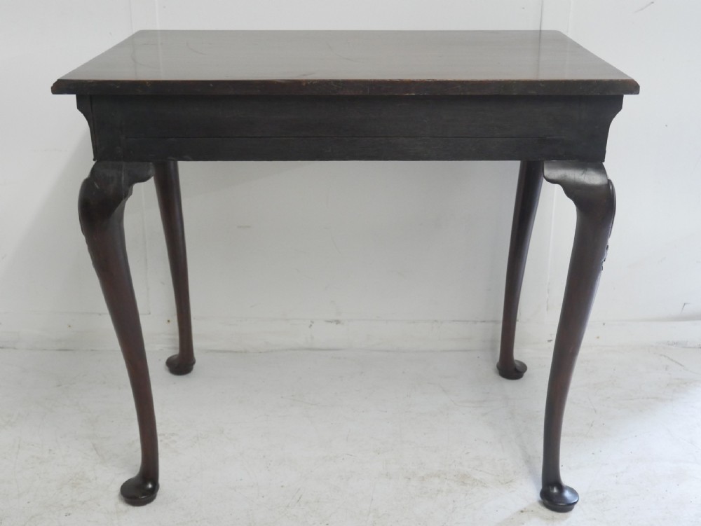 A 19th-century dark mahogany side table featuring a single frieze drawer, carved shell motifs on cabriole legs, and pad feet. View VIII
