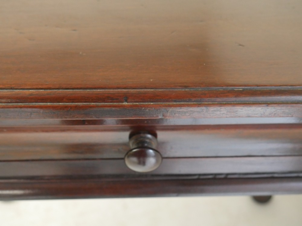 A 19th-century dark mahogany side table featuring a single frieze drawer, carved shell motifs on cabriole legs, and pad feet. View XI