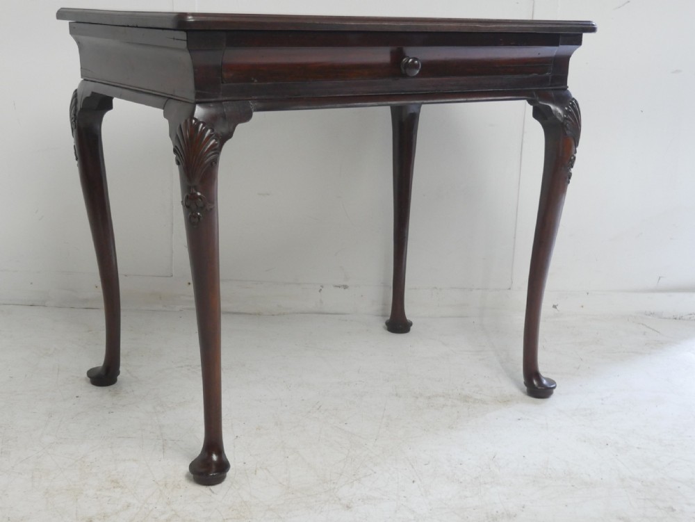 A 19th-century dark mahogany side table featuring a single frieze drawer, carved shell motifs on cabriole legs, and pad feet. View XIII