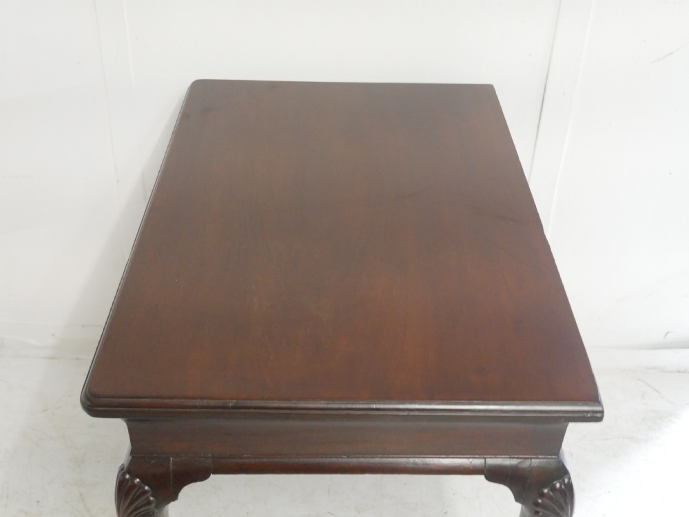 A 19th-century dark mahogany side table featuring a single frieze drawer, carved shell motifs on cabriole legs, and pad feet. View XIV