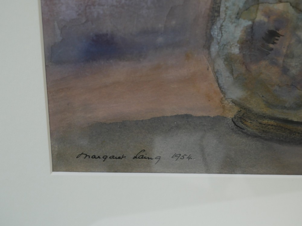 A framed watercolour painting depicting white and yellow flowers in a decorative cream jug, signed Margaret Laing and dated 1954. View V