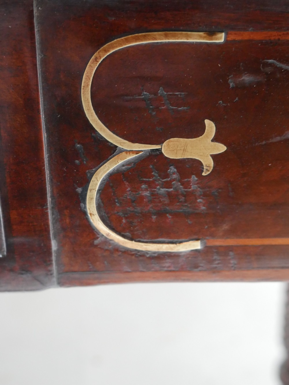 A large antique mahogany extending dining table featuring spiral-turned legs and fitted brass castors. View VIII