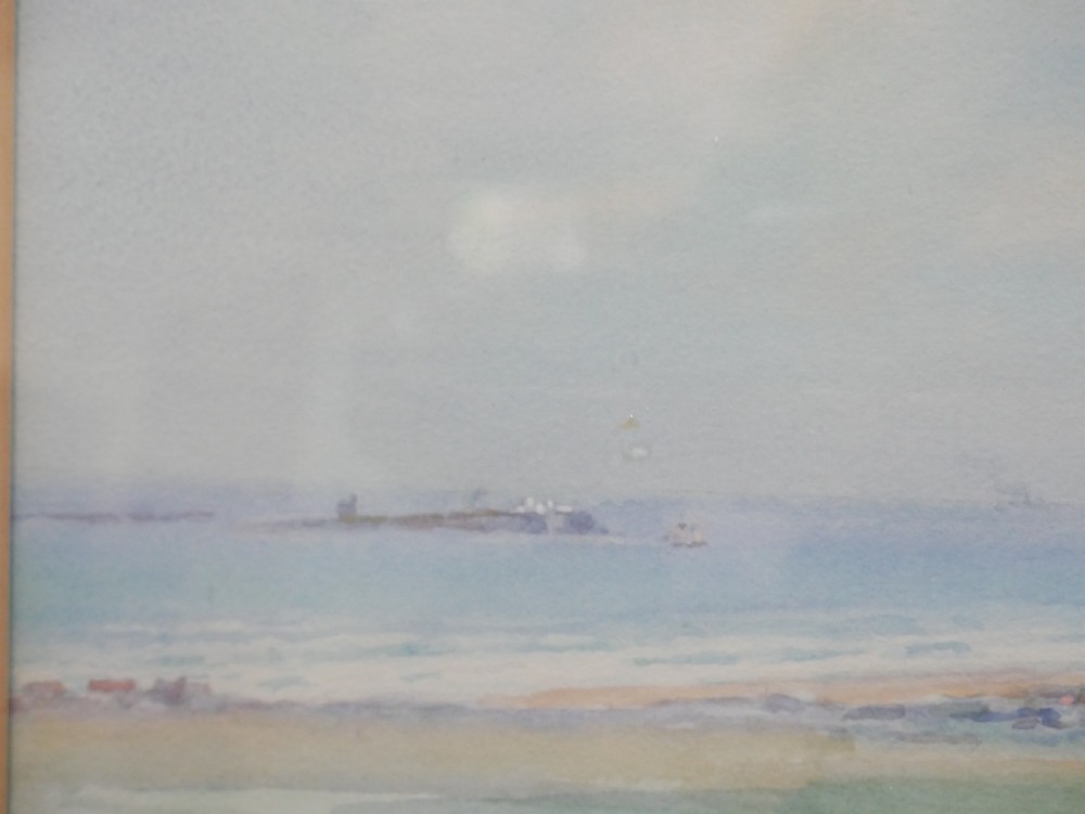 A framed watercolour landscape painting by Frank Wood depicting Bamburgh Castle on the Northumberland coast under a pale sky. View VIII