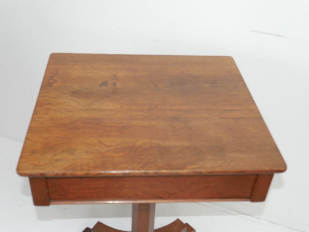 A square-topped antique oak side table featuring a central column support resting on a curved four-legged pedestal base. View III