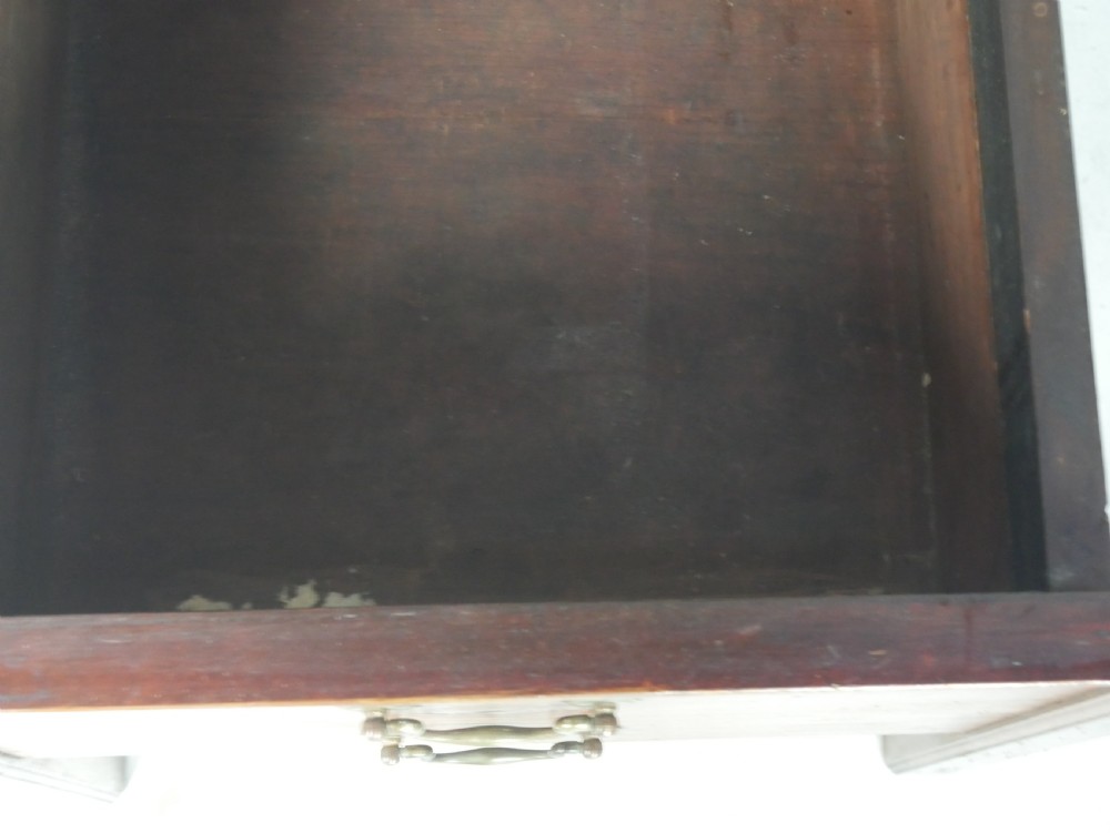 A Georgian mahogany bedside cabinet featuring a tray top gallery, two cupboard doors with string inlay, and two drawers with brass swan-neck handles. View VIII