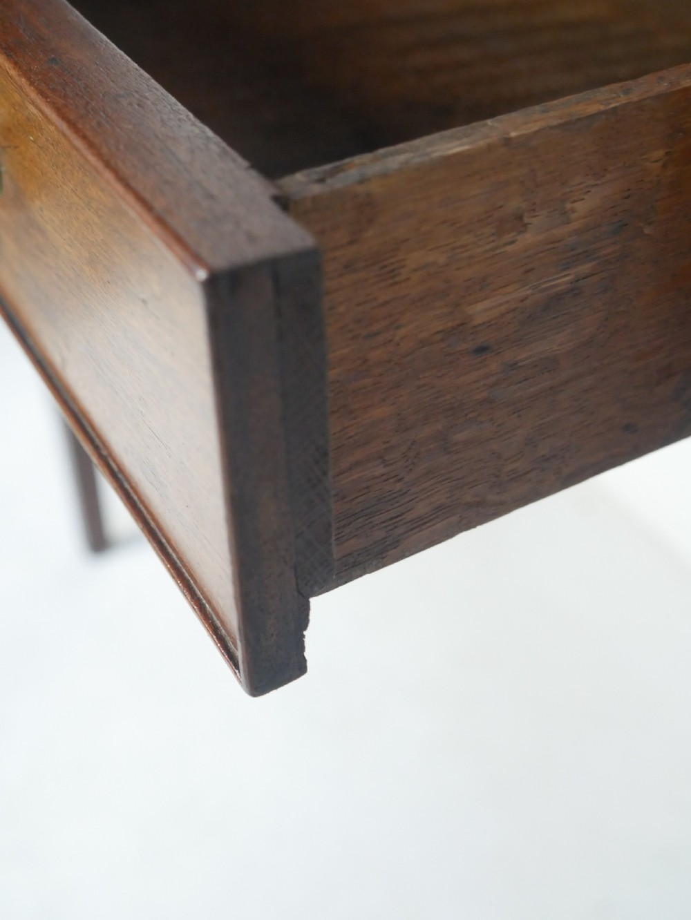 A mahogany bonheur de jour writing desk featuring a raised rear cabinet with two small doors and a central niche above a single frieze drawer on square tapered legs. View VI