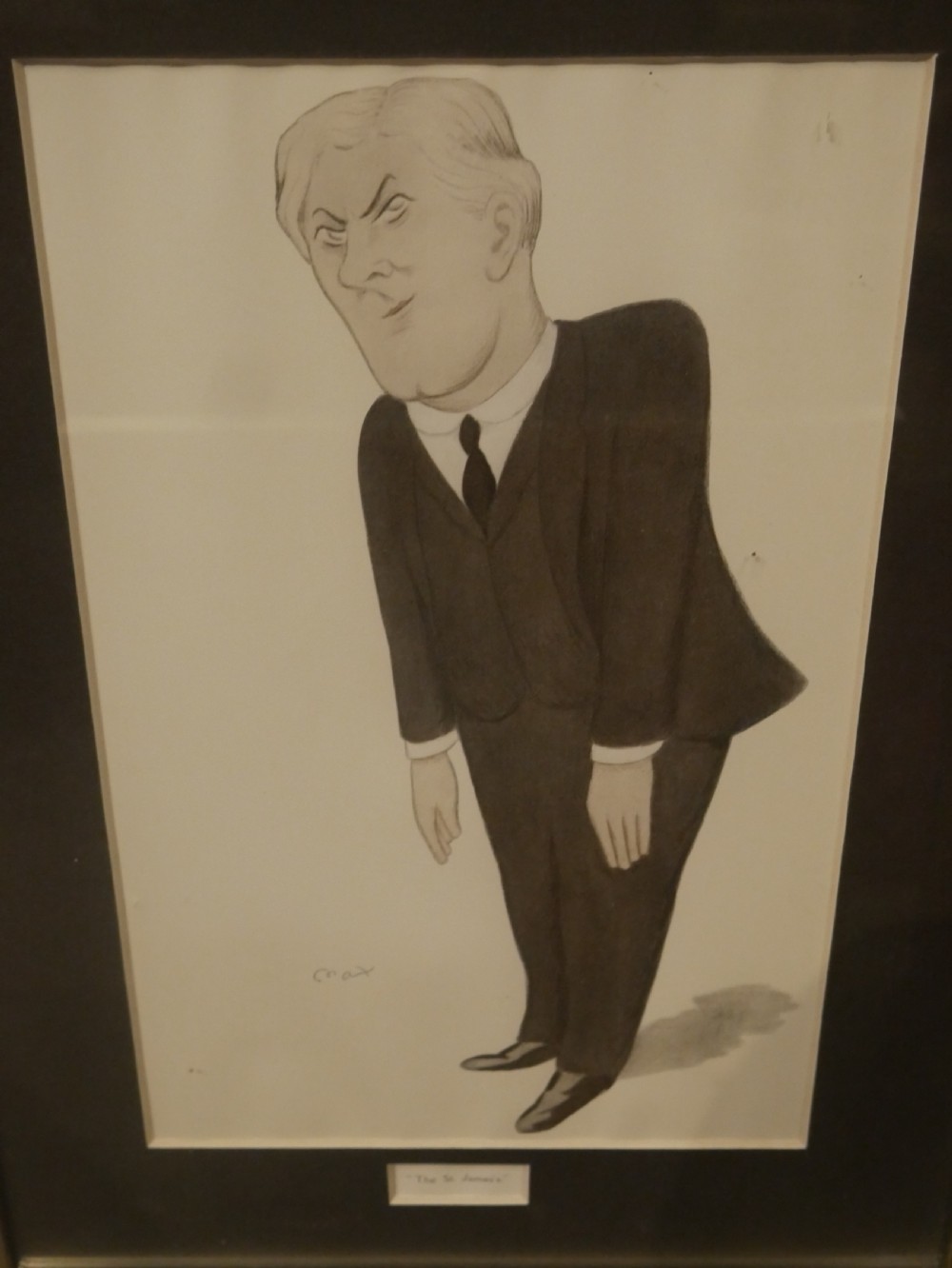 A collection of six framed antique Vanity Fair lithograph prints featuring caricatures of men in formal Victorian and Edwardian attire. View V