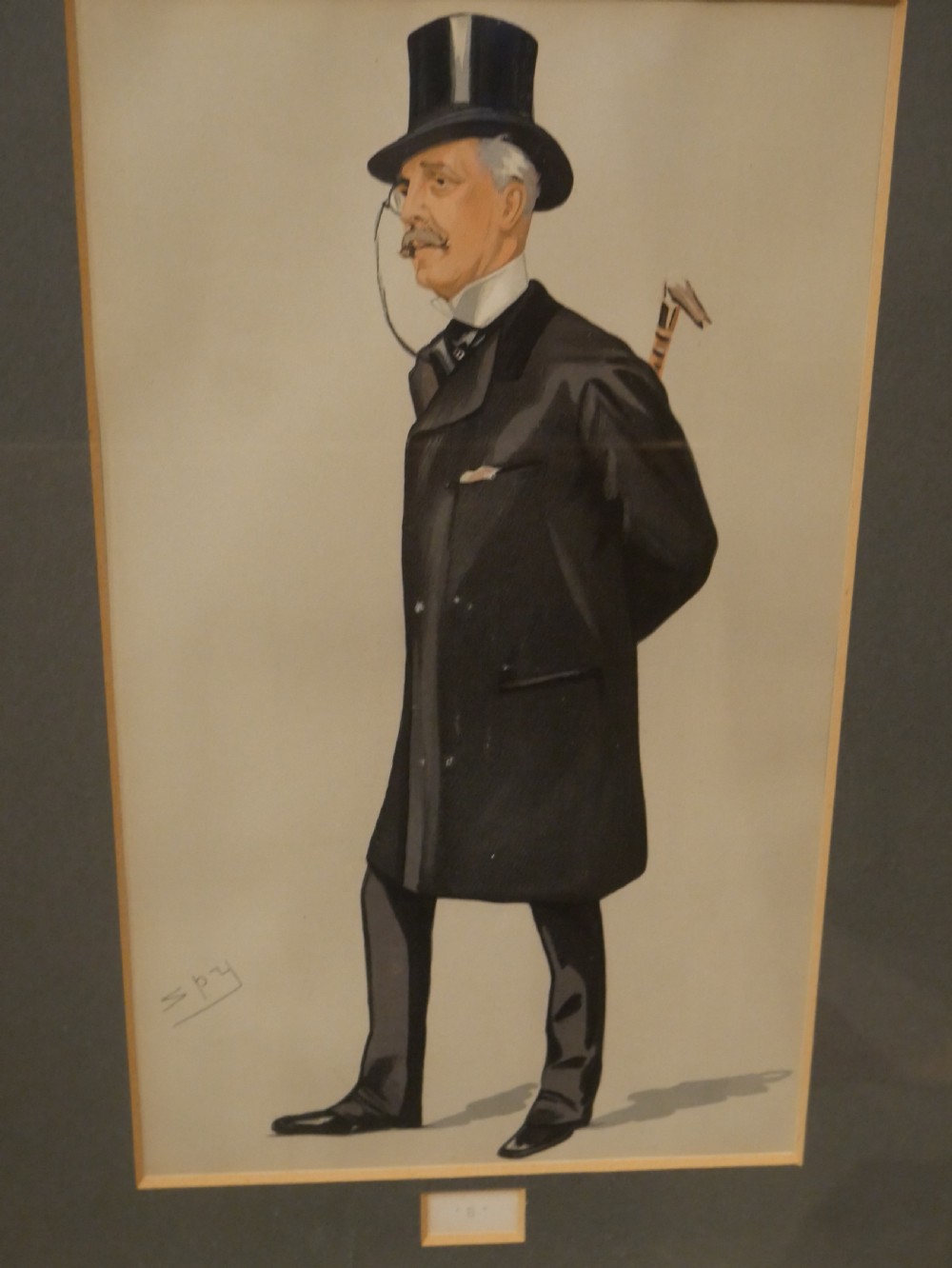 A collection of six framed antique Vanity Fair lithograph prints featuring caricatures of men in formal Victorian and Edwardian attire. View VII