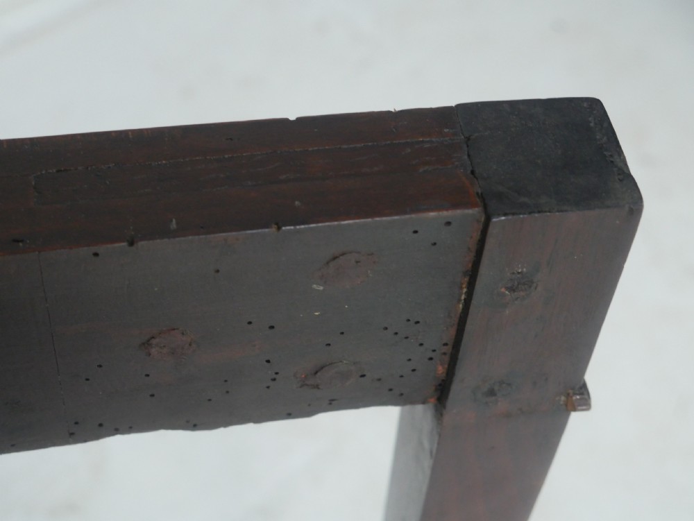 A Georgian mahogany demi-lune side table featuring a semi-circular top and four slender square tapered legs. View IX