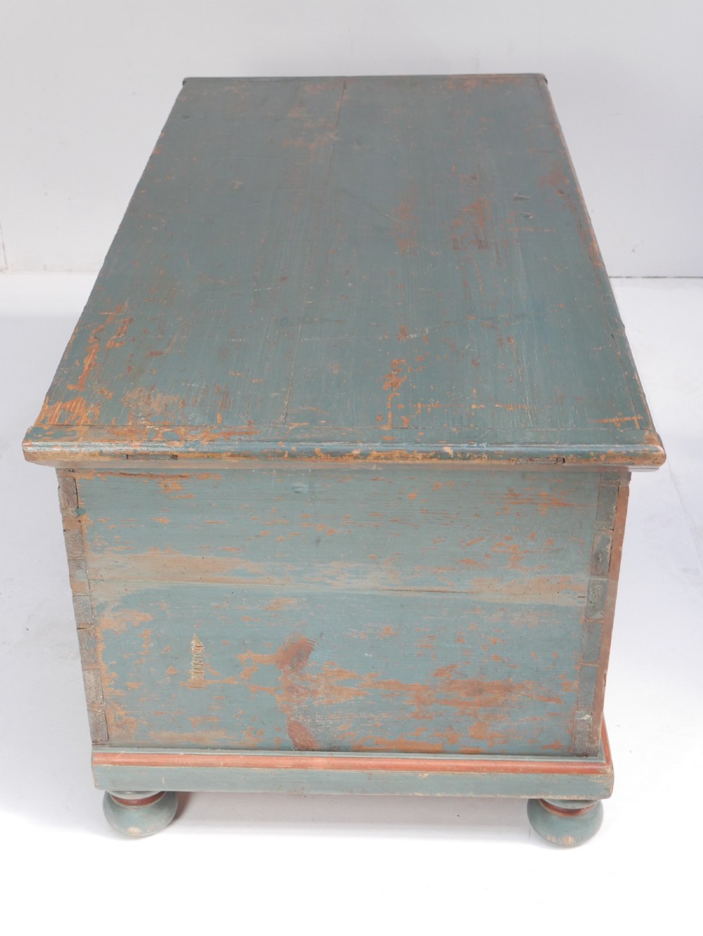 A 19th-century Swedish painted wooden coffer chest featuring green paint, oval floral medallions, moulded framing, and hand-painted initials dated 1810. View VI