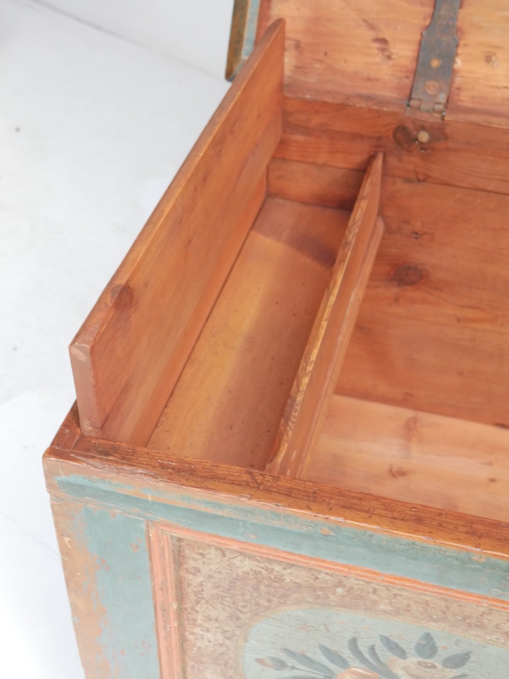 A 19th-century Swedish painted wooden coffer chest featuring green paint, oval floral medallions, moulded framing, and hand-painted initials dated 1810. View IX